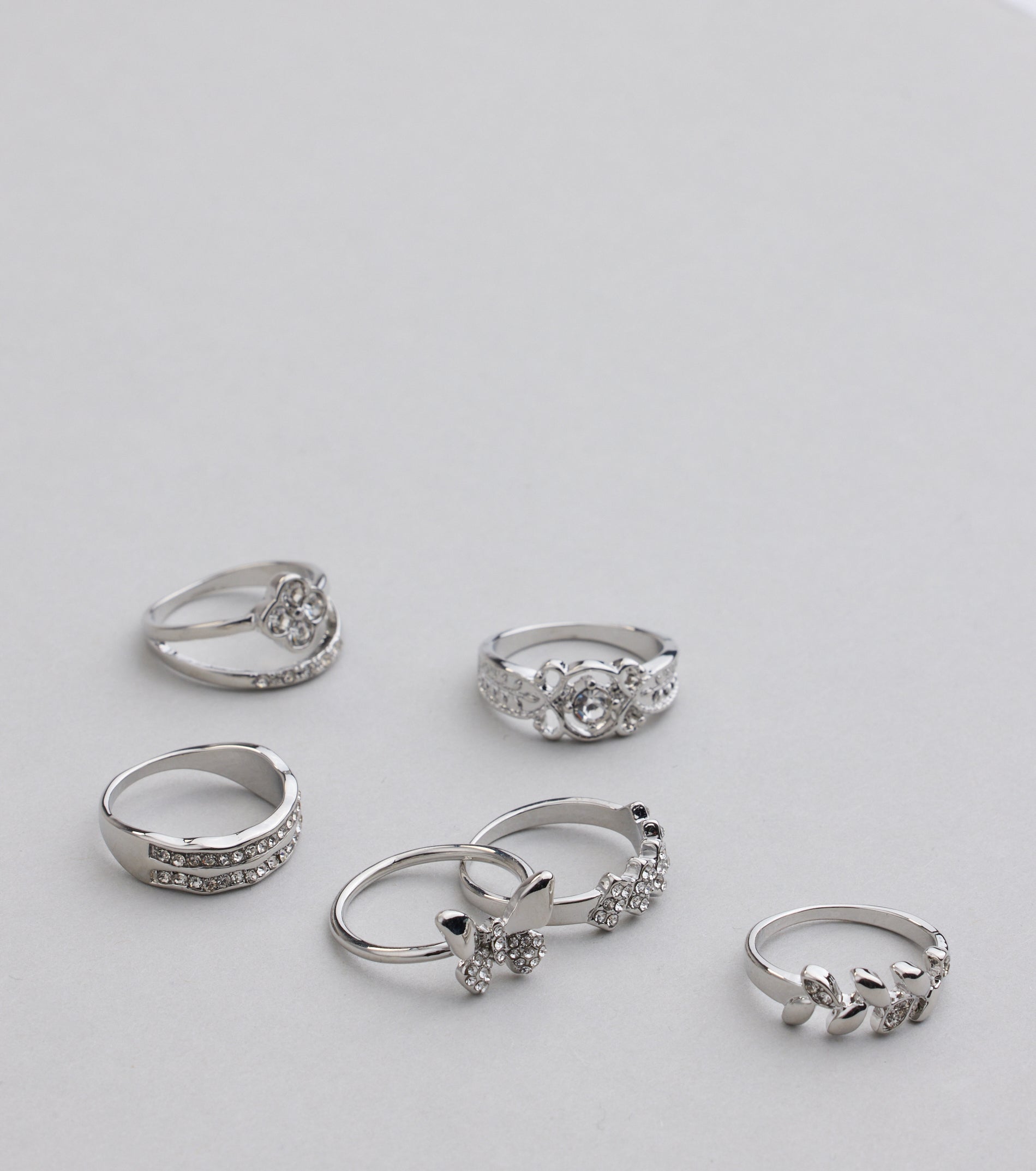 Take A Bow Rhinestone Eight Pack Ring Set
