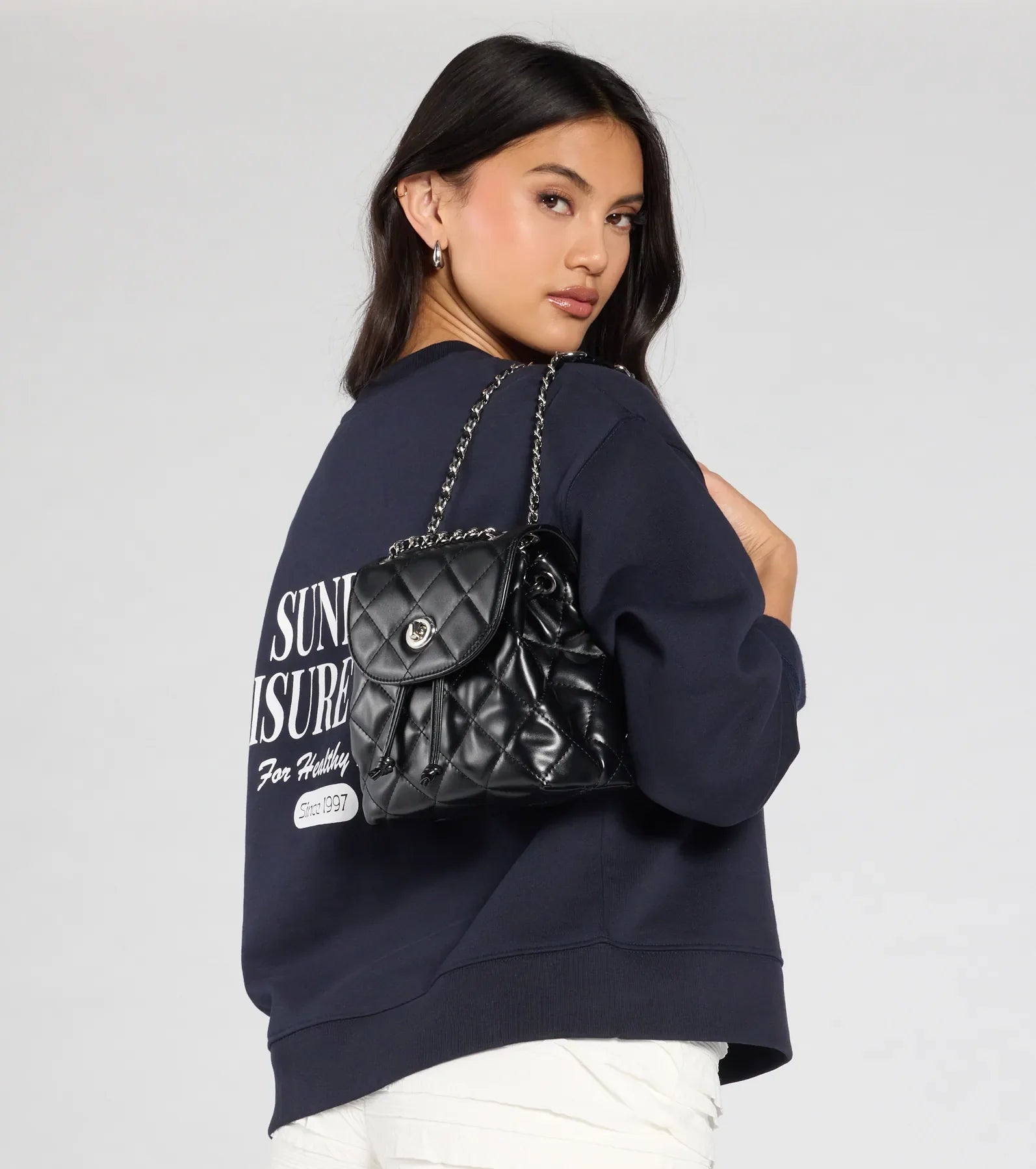 Edgy Quilted Faux Leather Mini Backpack