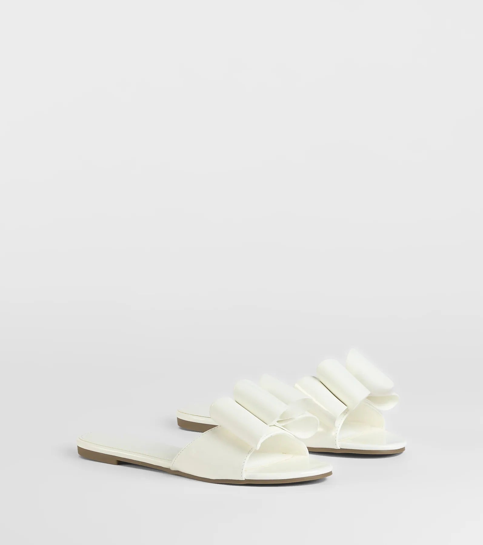 Charmed Intent Bow Sandals